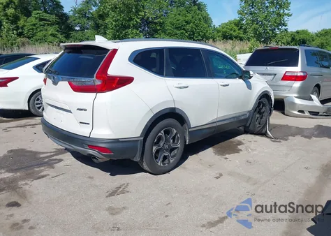 2019 Honda Cr-V Touring z USA, uszkodzony, nr VIN JHLRW2H98KX003911